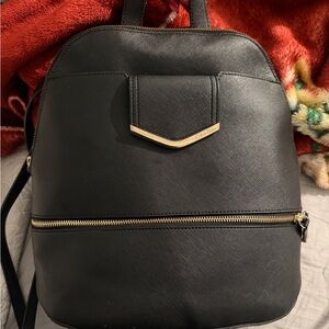 Calvin Klein Black and Gold Backpack